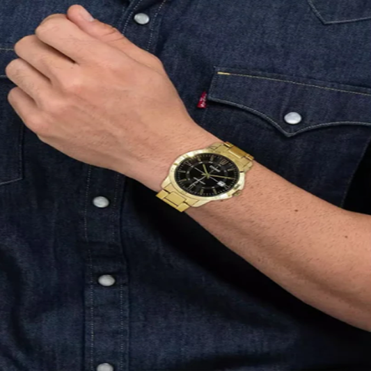 ساعة كاسيو الرجالية بـ سوار ستانلس ستيل ذهبي مينا سوداء - موديل CASIO MTP-V004G-1C