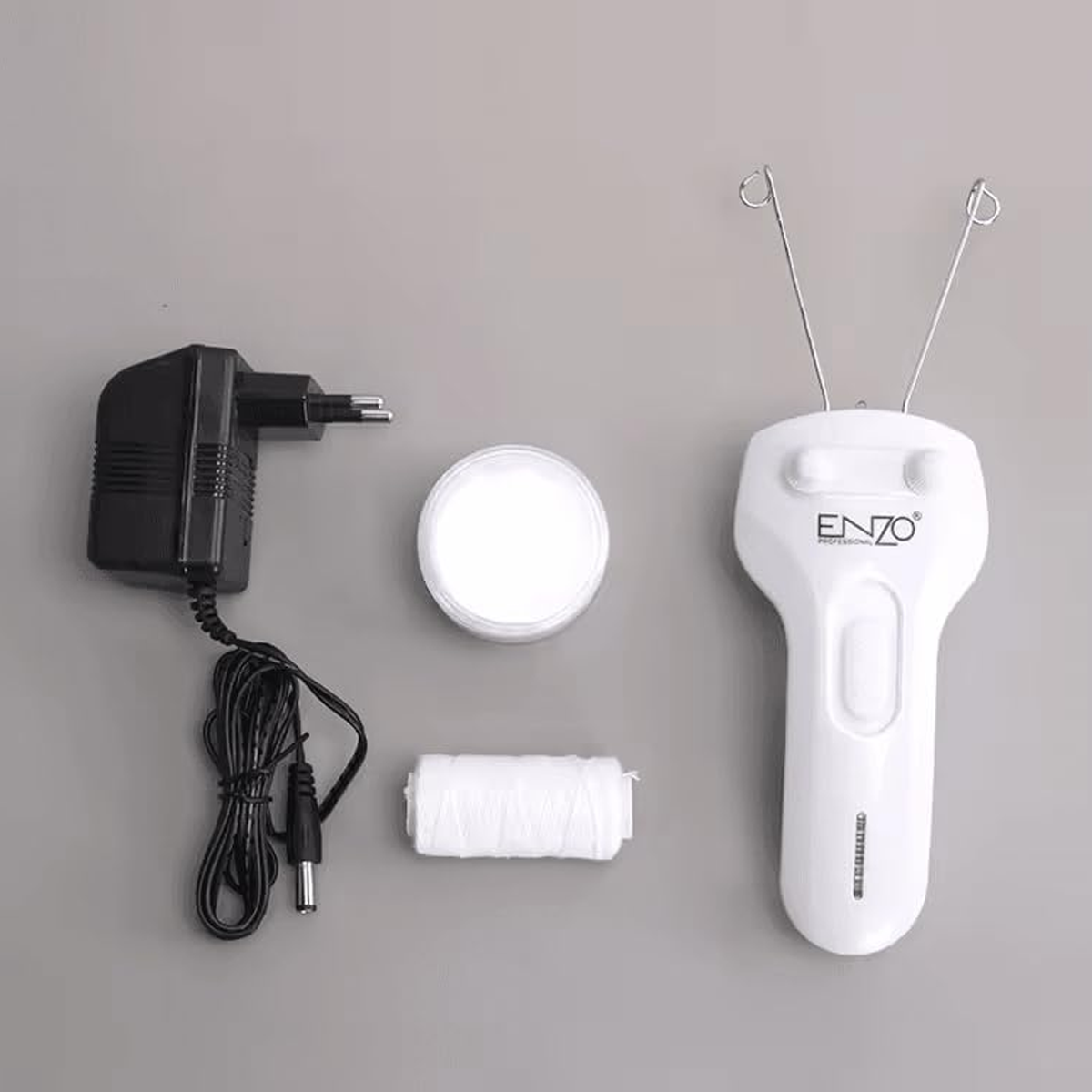 ماكينة خيط لإزالة شعر الوجه من جذوره بخيوط قطنية ماركة ENZO ماكينة خيط لإزالة شعر الوجه من جذوره بخيوط قطنية ماركة ENZO