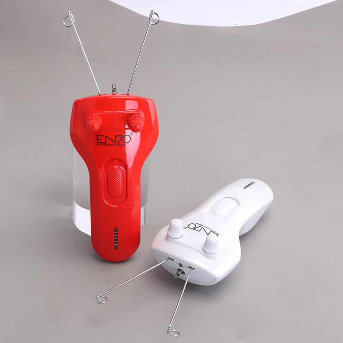 ماكينة خيط لإزالة شعر الوجه من جذوره بخيوط قطنية ماركة ENZO ماكينة خيط لإزالة شعر الوجه من جذوره بخيوط قطنية ماركة ENZO